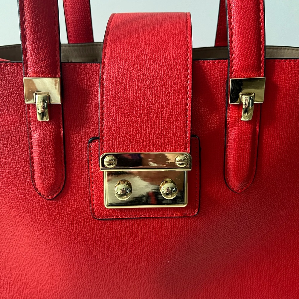 Kate Landry Red-Orange purse11” x 15” with gold clasp. Beautiful condition!